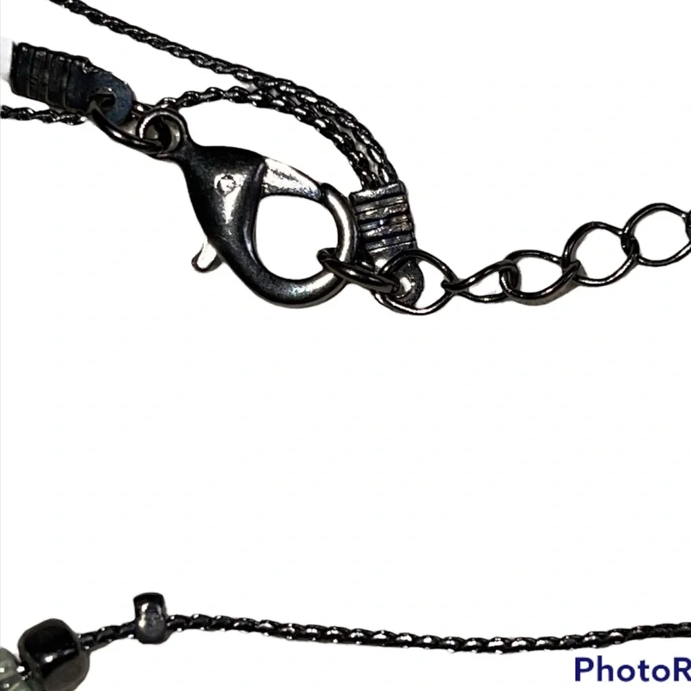 Double stranded designer necklace with multi faceted stones in euc